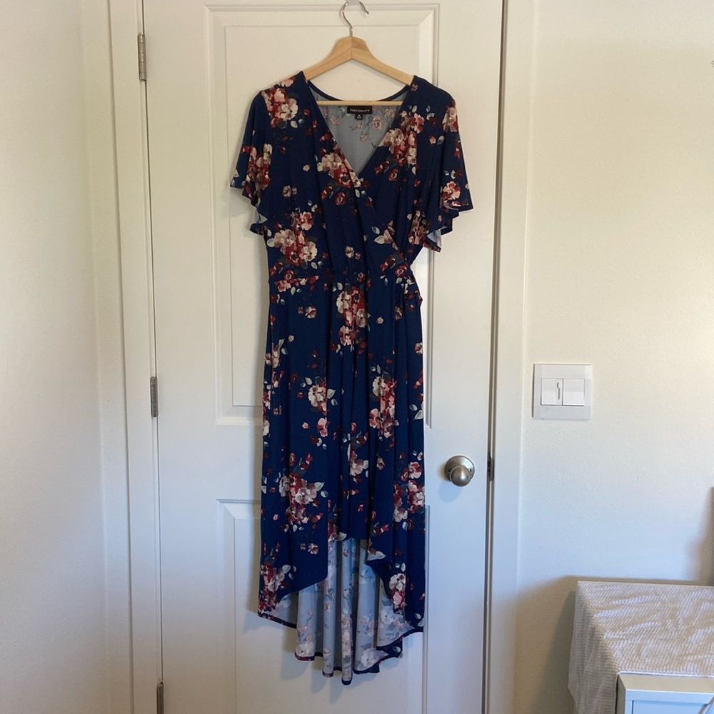 Fortune and Ivy 3X high-low wrap dress with short sleeves blue background